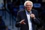 Bernie Sanders vows to stay in 2020 race and says he is looking forward to debate with Joe Biden
